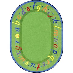 Kid Essentials AlphaScript 7'8" x 10'9" Oval Area Rug in Color Green