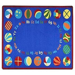 Kid Essentials Bouncy Balls 5'4" x 7'8" Oval Area Rug in Color Multi