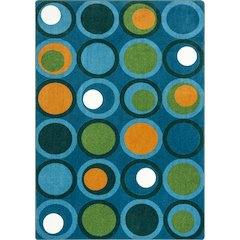 Kid Essentials Circle Back 5'4" x 7'8" Area Rug in Color Citrus