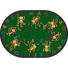 Kid Essentials Monkey Business 5'4" x 7'8" Oval Area Rug in Color Green