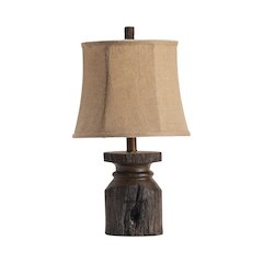 Brown Resin Lamp With Carved Base And Tan Shade