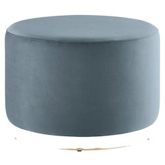 Round performance velvet ottoman with plush upholstery and versatile design