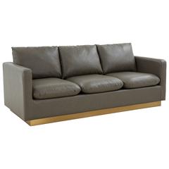 Nervo Modern Mid-Century Upholstered Leather Sofa with Gold Frame