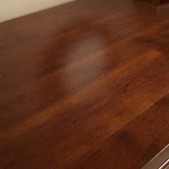 Traditional brown wood desk with hutch and spacious workspace