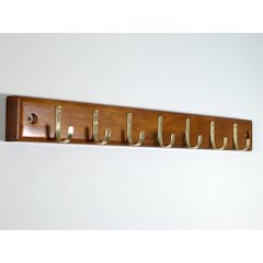 Home Essential belt hanger bar in Walnut finish.