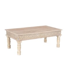 Eldris Carved Solid Wood Coffee Table