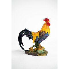 Coloured Rooster Standing On Corn Statue