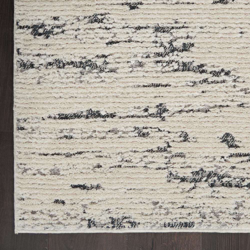 Nourison Textured Contemporary Area Rug, 8'10" x 11'10", Ivory Blue. Picture 4