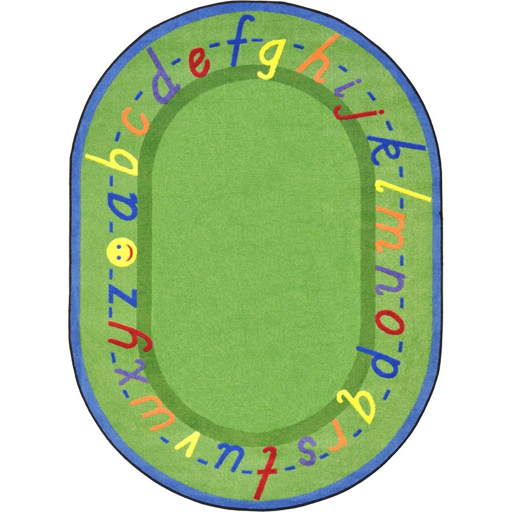 Kid Essentials AlphaScript 7'8" x 10'9" Oval Area Rug in Color Green. Picture 1