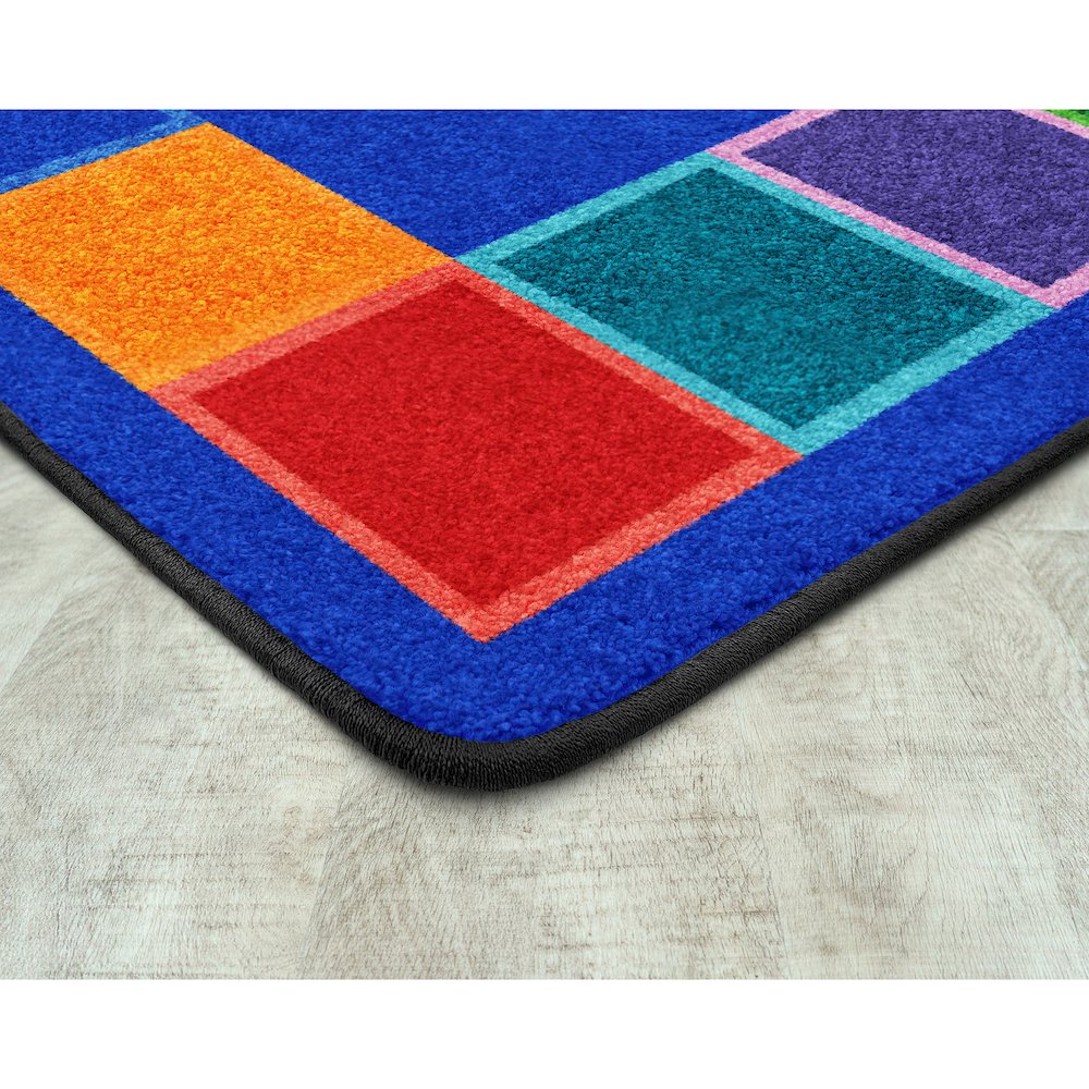 Kid Essentials Color Tones 5'4" x 7'8" Oval Area Rug in Color Multi. Picture 2