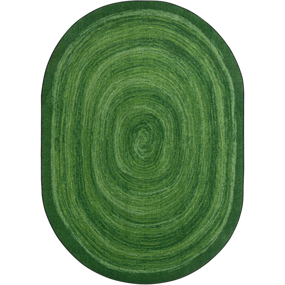 Kid Essentials Feeling Fun 7'8" x 10'9" Oval Area Rug in Color Green. Picture 1
