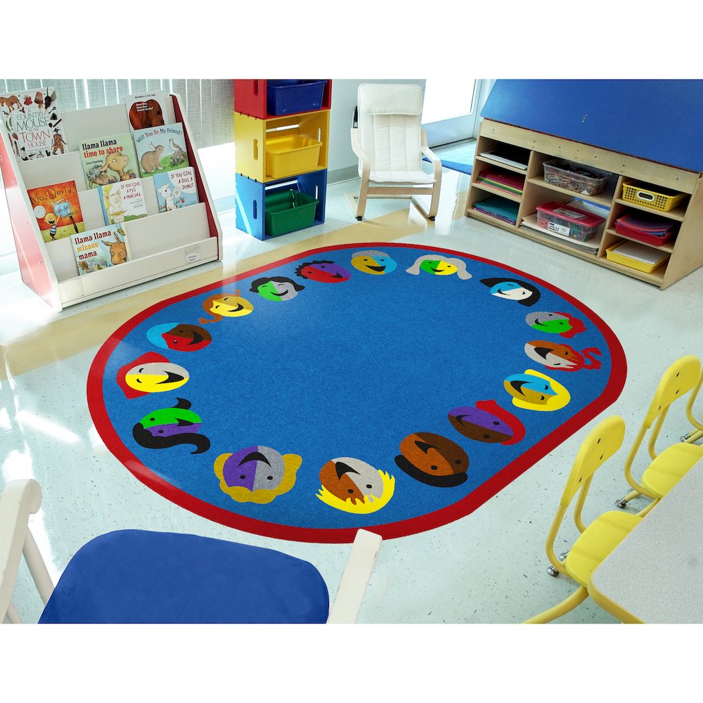 Kid Essentials Joyful Faces 10'9" x 13'2" Oval Area Rug in Color Blue. Picture 3