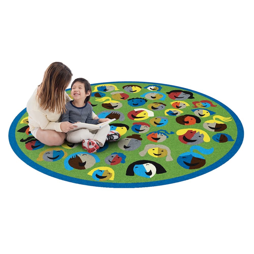 Kid Essentials Joyful Faces 7'7" Round Area Rug in Color Green. Picture 2