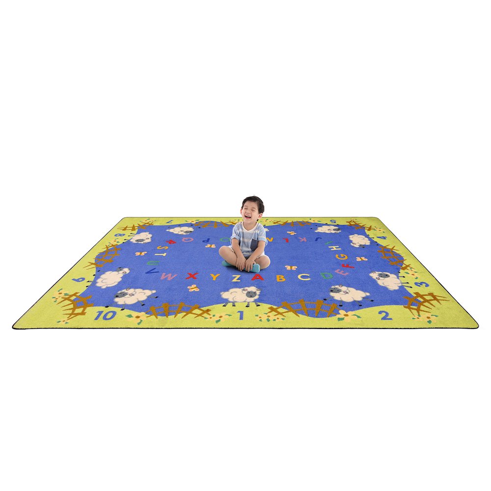 Kid Essentials Lamby Pie 7'8" x 10'9" Area Rug in Color Multi. Picture 2