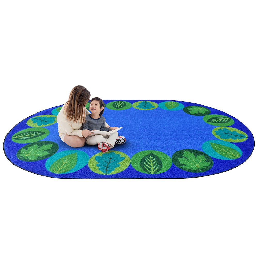 Kid Essentials Lively Leaves 10'9" x 13'2" Oval Area Rug in Color Multi. Picture 2
