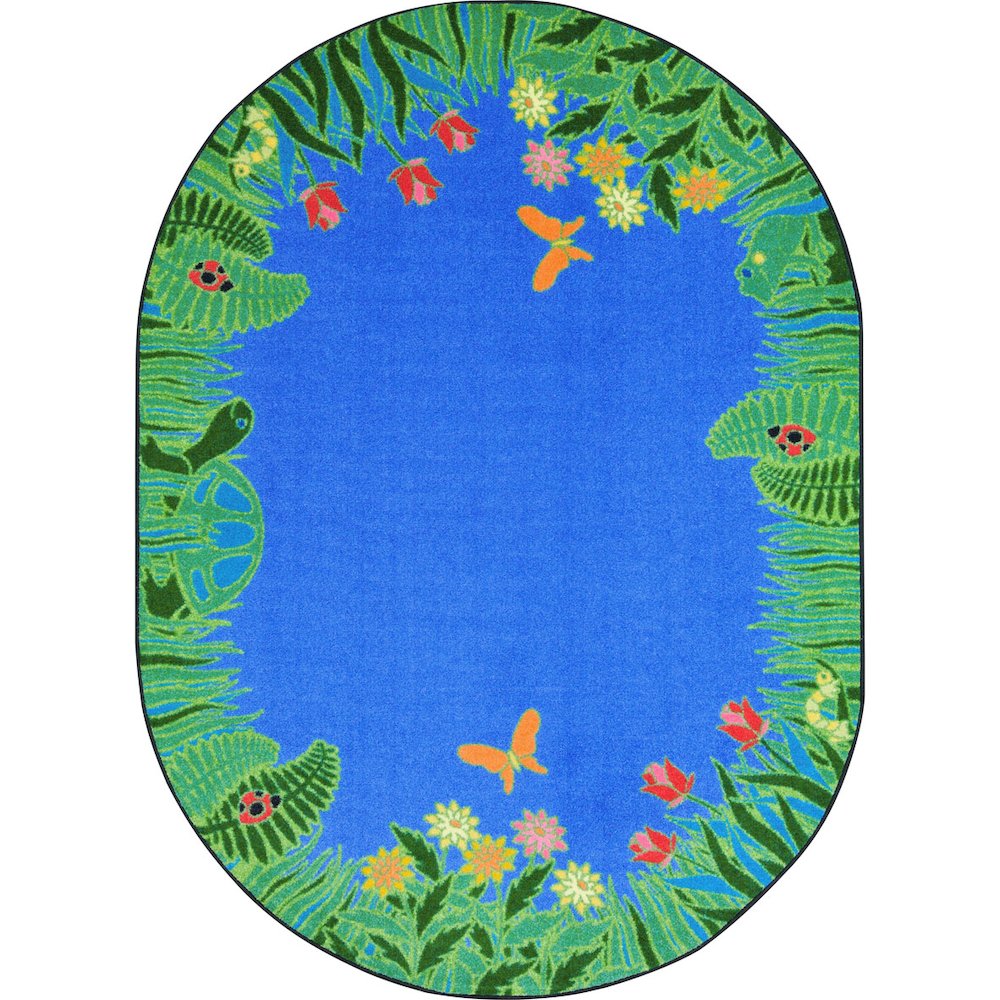 Kid Essentials Merry Meadows 7'8" x 10'9" Oval Area Rug in Color Blue. Picture 1