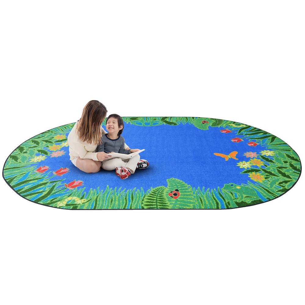 Kid Essentials Merry Meadows 10'9" x 13'2" Oval Area Rug in Color Blue. Picture 2