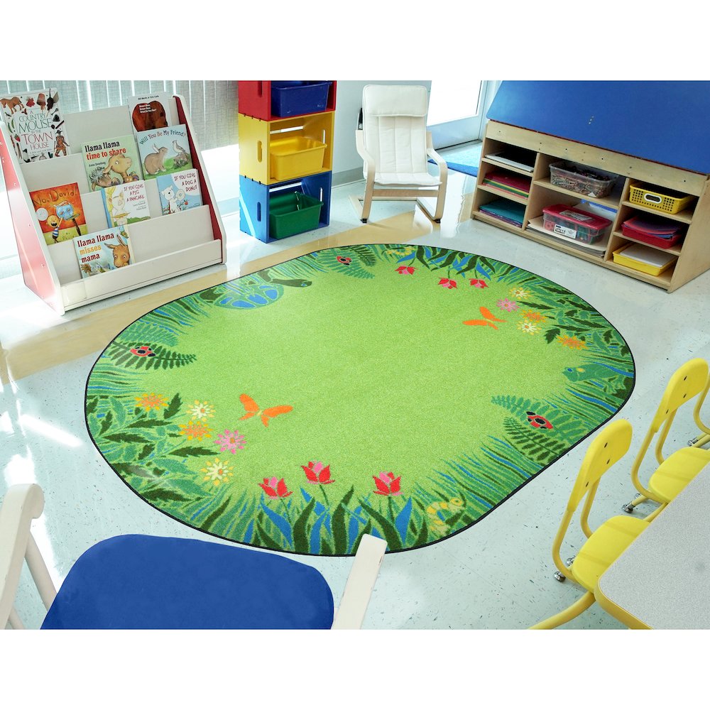 Kid Essentials Merry Meadows 10'9" x 13'2" Oval Area Rug in Color Green. Picture 3