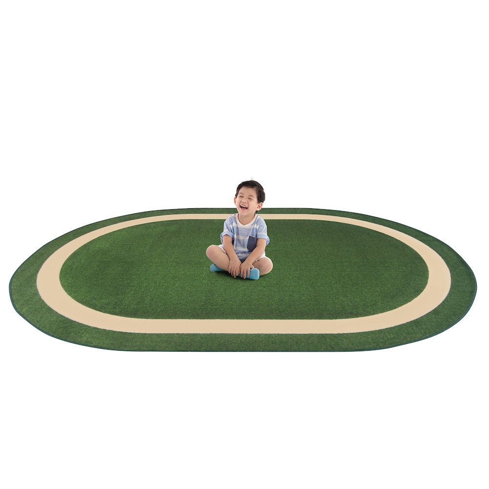 Kid Essentials Portrait 7'8" x 10'9" Oval Area Rug in Color Greenfield. Picture 2