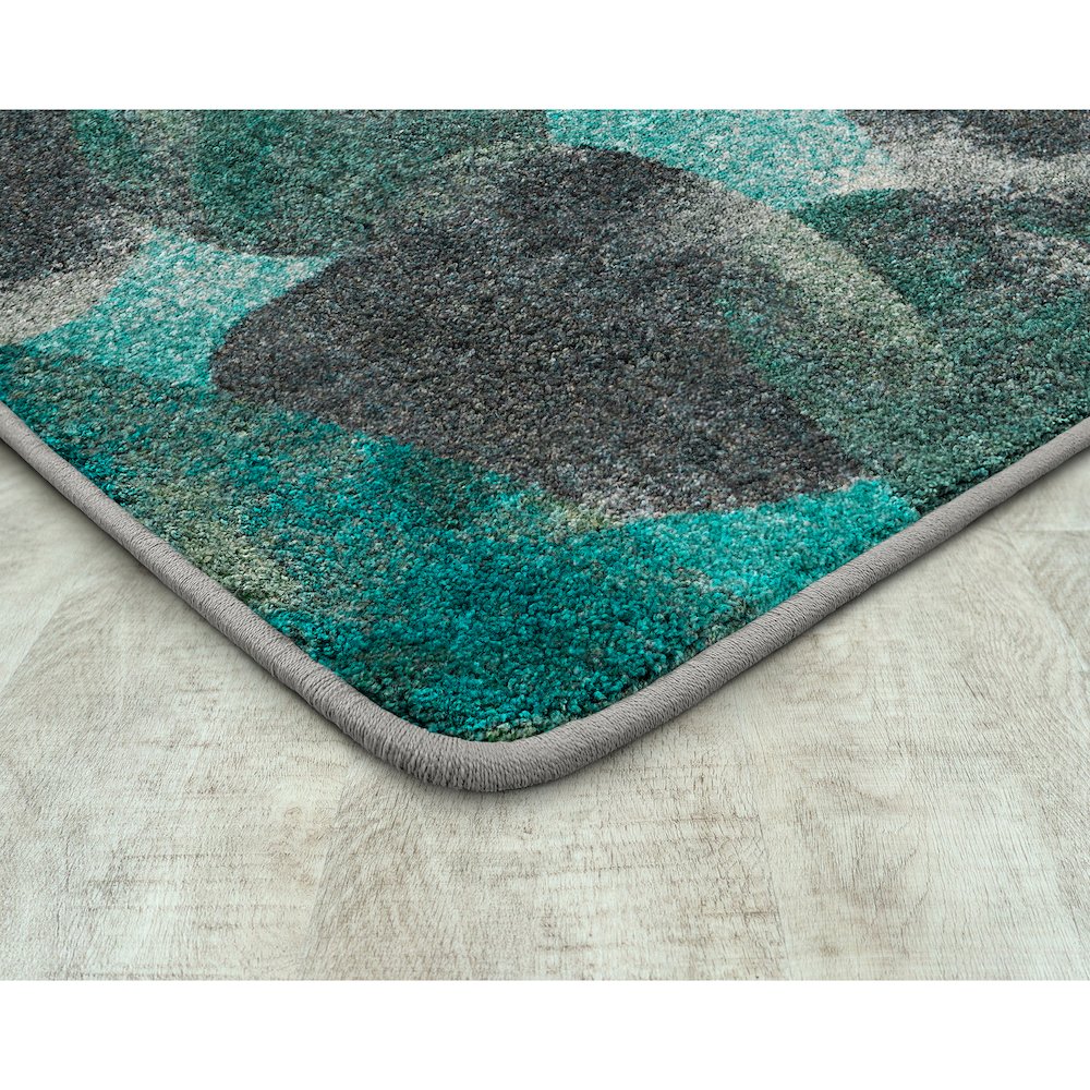 Kid Essentials Riverstone 7'8" x 10'9" Area Rug in Color Teal. Picture 2