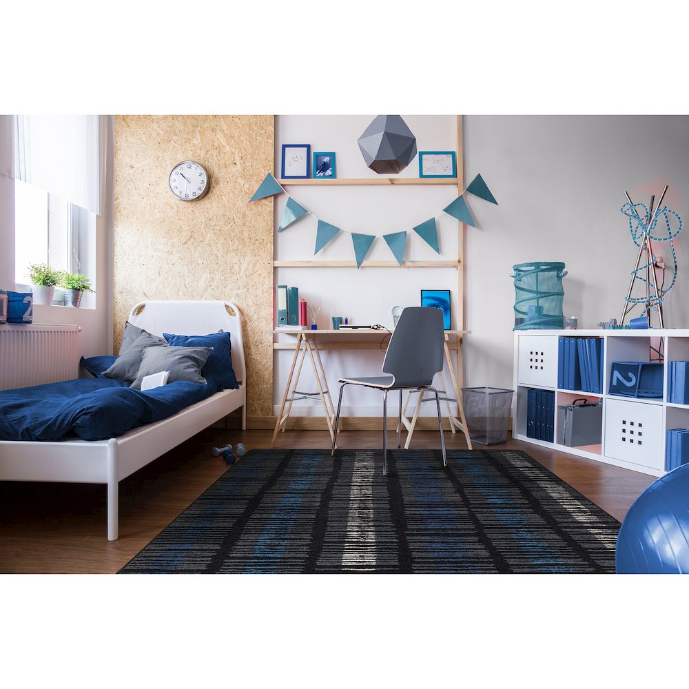 Kid Essentials Verve 5'4" x 7'8" Area Rug in Color Sapphire. Picture 3