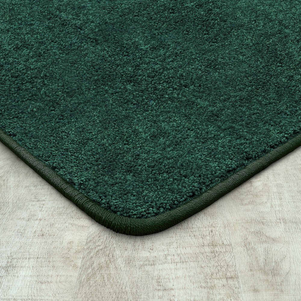 Kid Essentials Endurance 6' x 9' Area Rug in Color Forest. Picture 1
