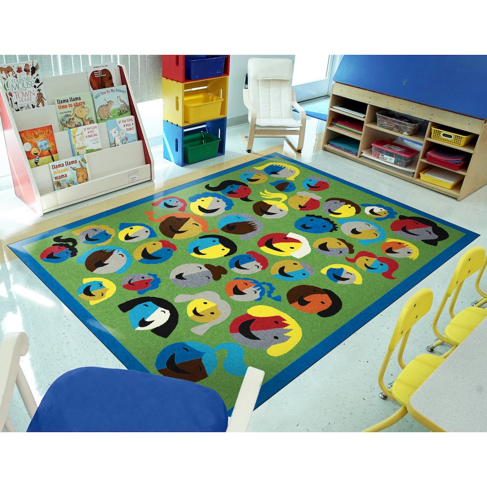 Kid Essentials Joyful Faces 7'8" x 10'9" Area Rug in Color Green. Picture 3