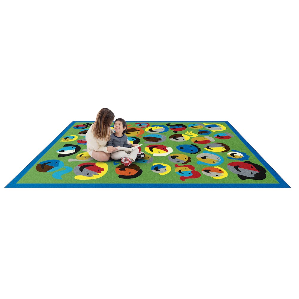 Kid Essentials Joyful Faces 7'8" x 10'9" Area Rug in Color Green. Picture 2