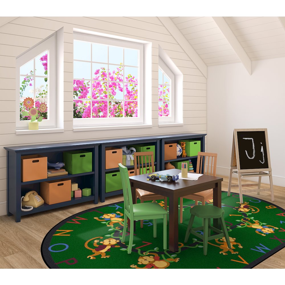 Kid Essentials Monkey Business 10'9" x 13'2" Oval Area Rug in Color Green. Picture 3