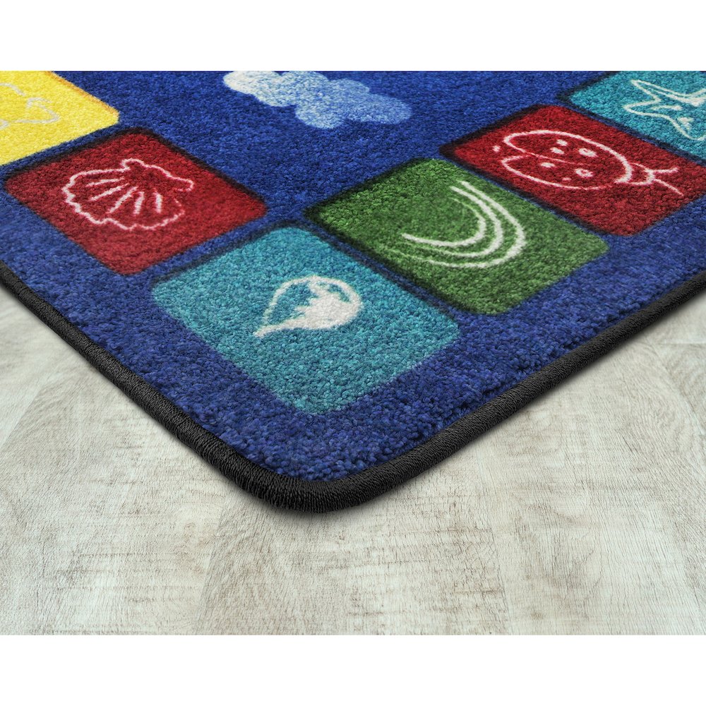 Kid Essentials One World 10'9" x 13'2" Area Rug in Color Primary. Picture 2