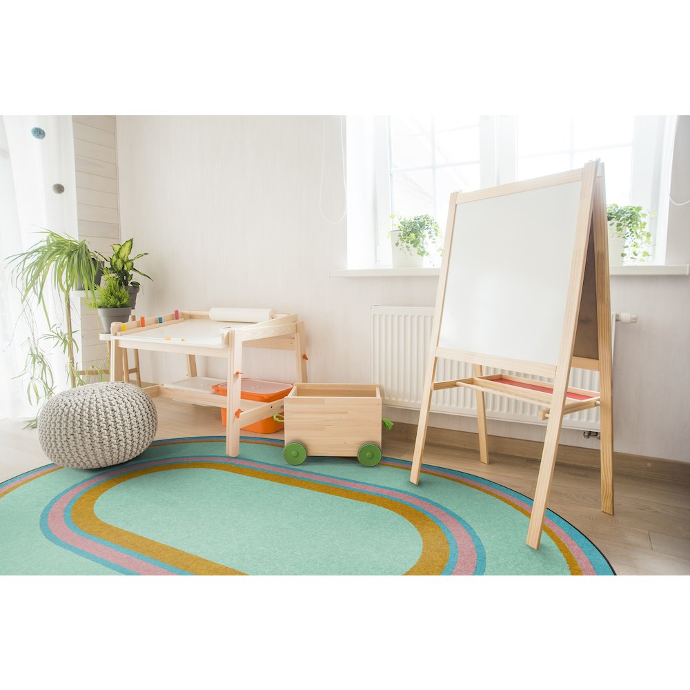 Kid Essentials Ripples 7'8" x 10'9" Oval Area Rug in Color Teal. Picture 3