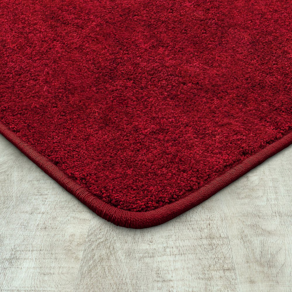 Kid Essentials Endurance 12' x 6' Area Rug in Color Burgundy. Picture 1