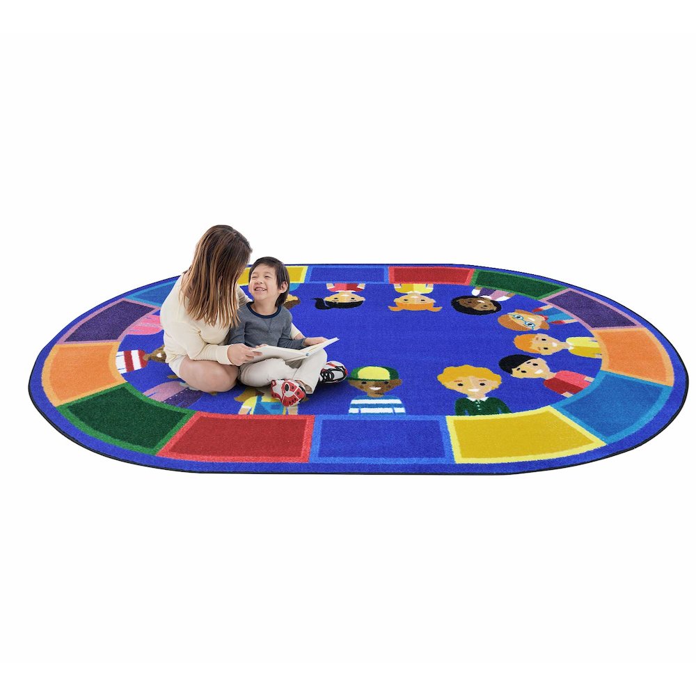 Kid Essentials All of Us Together 10'9" x 13'2" Oval Area Rug in Color Multi. Picture 2