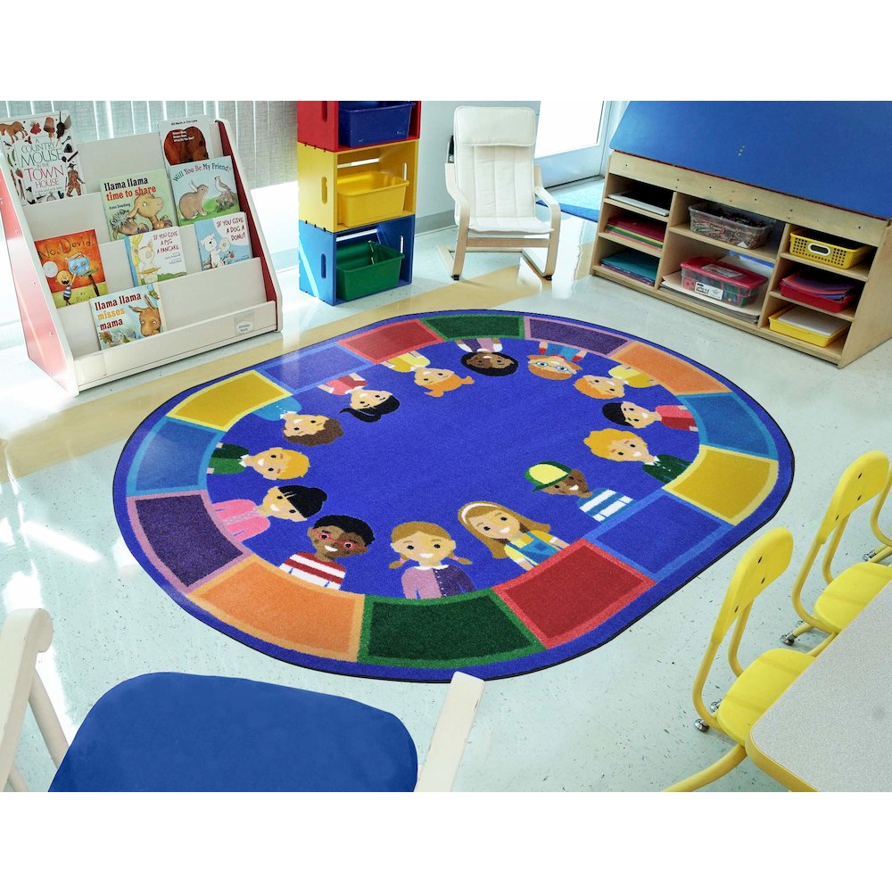 Kid Essentials All of Us Together 10'9" x 13'2" Oval Area Rug in Color Multi. Picture 3