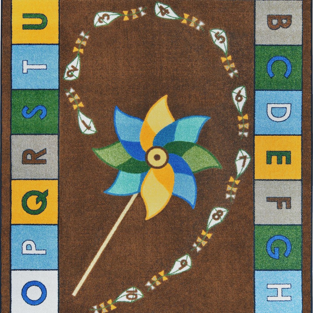 Kid Essentials Alphabet Pinwheel 5'4" x 7'8" Area Rug in Color Earthtone. Picture 2