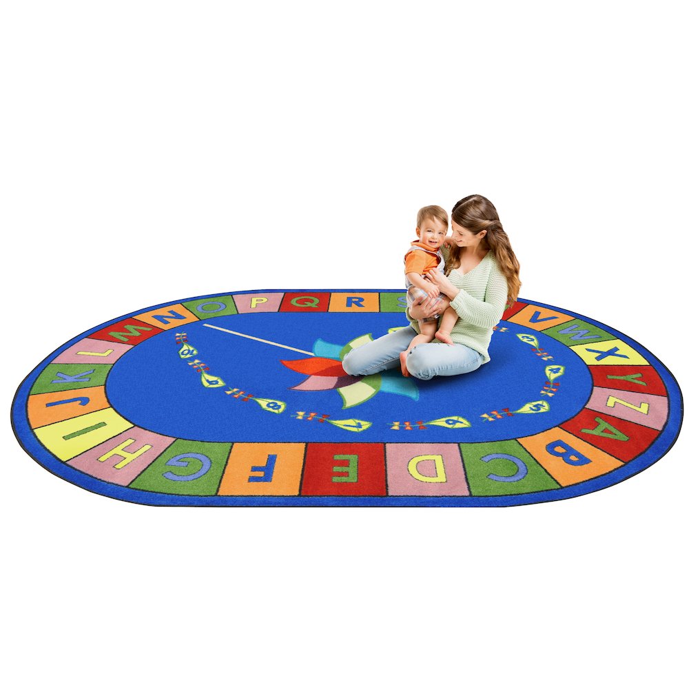 Kid Essentials Alphabet Pinwheel 5'4" x 7'8" Oval Area Rug in Color Multi. Picture 2