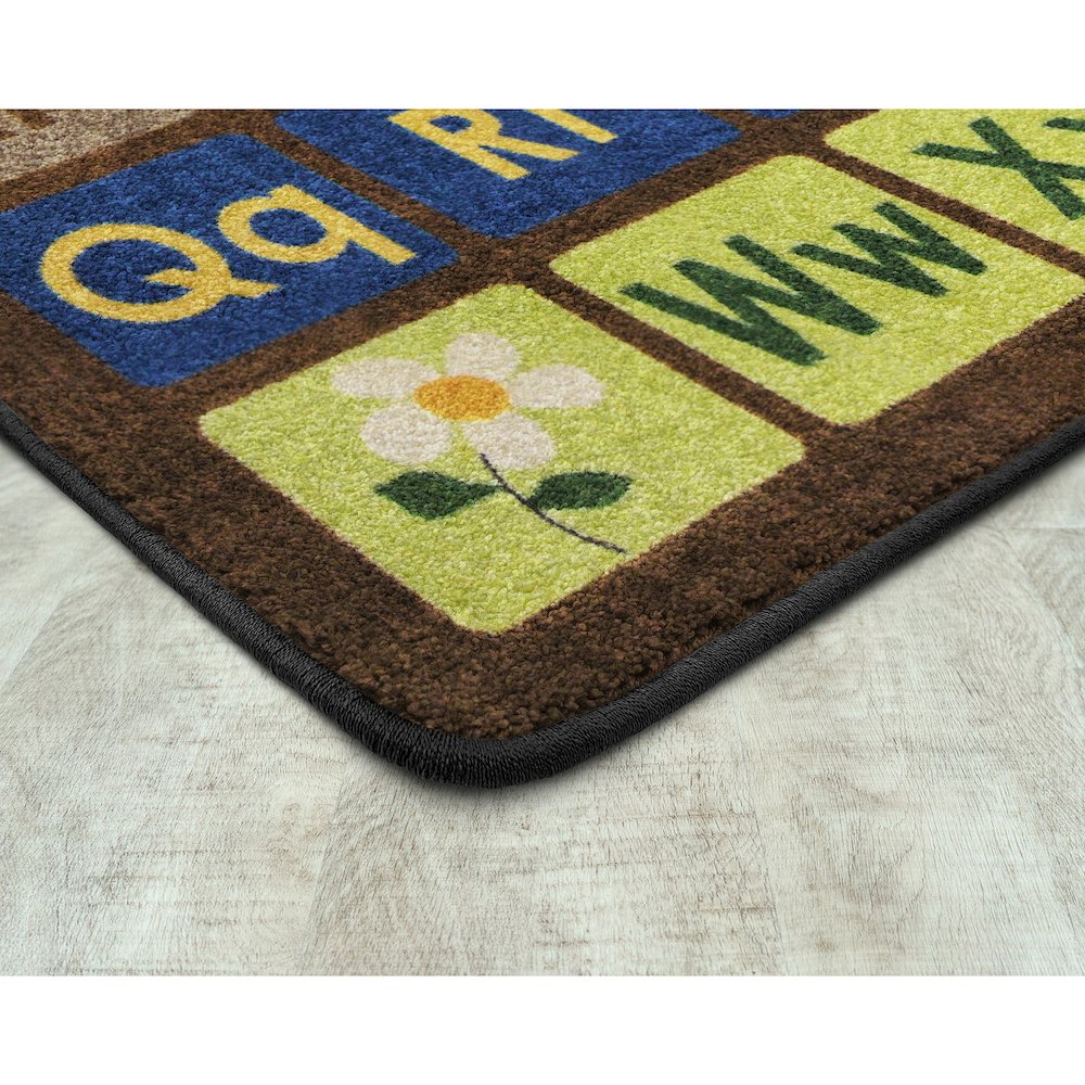 Kid Essentials Any Day Alphabet 5'4" x 7'8" Area Rug in Color Earthtone. Picture 2