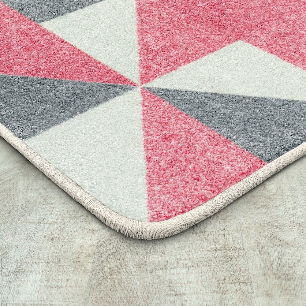 Claremont Kids Cartwheel 3'10" x 5'4" Area Rug in Color Blush. Picture 2