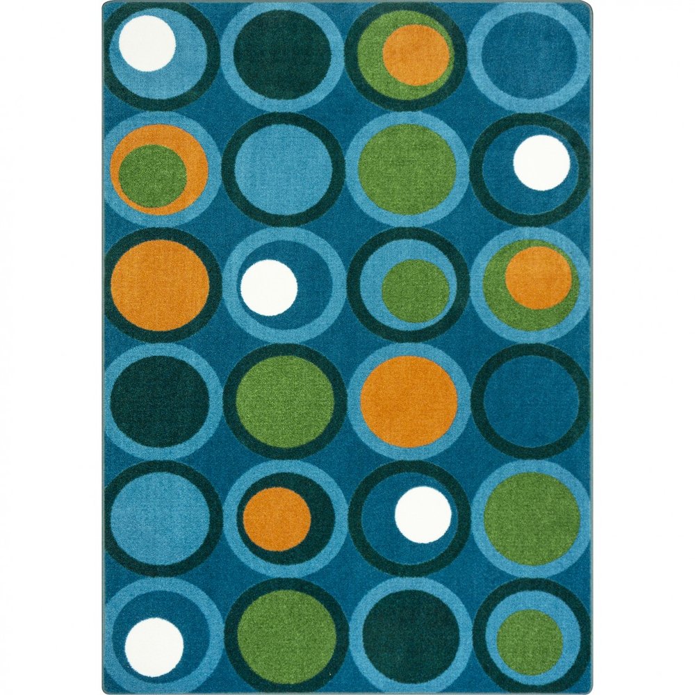 Kid Essentials Circle Back 5'4" x 7'8" Area Rug in Color Citrus. Picture 1