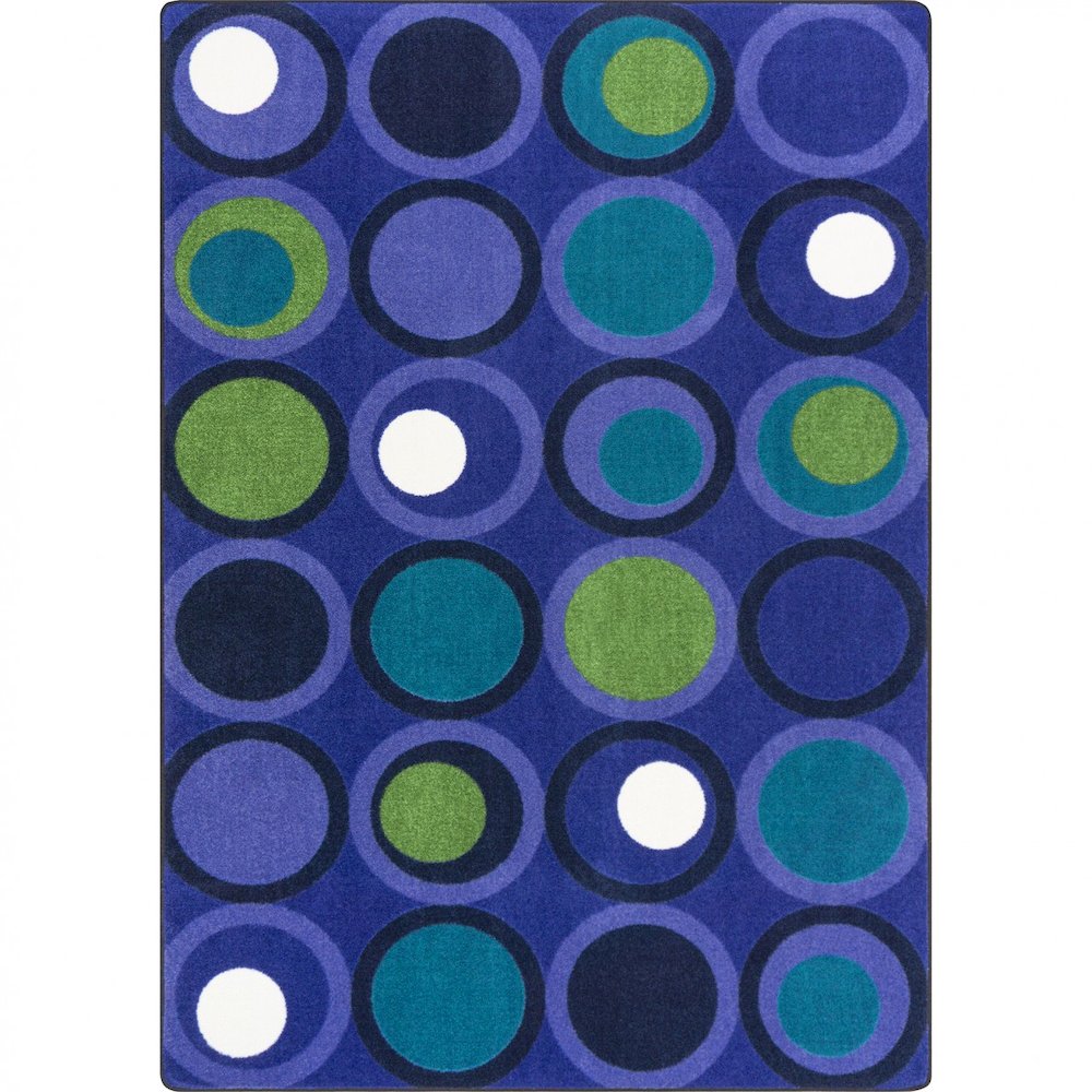 Kid Essentials Circle Back 5'4" x 7'8" Area Rug in Color Indigo. Picture 1