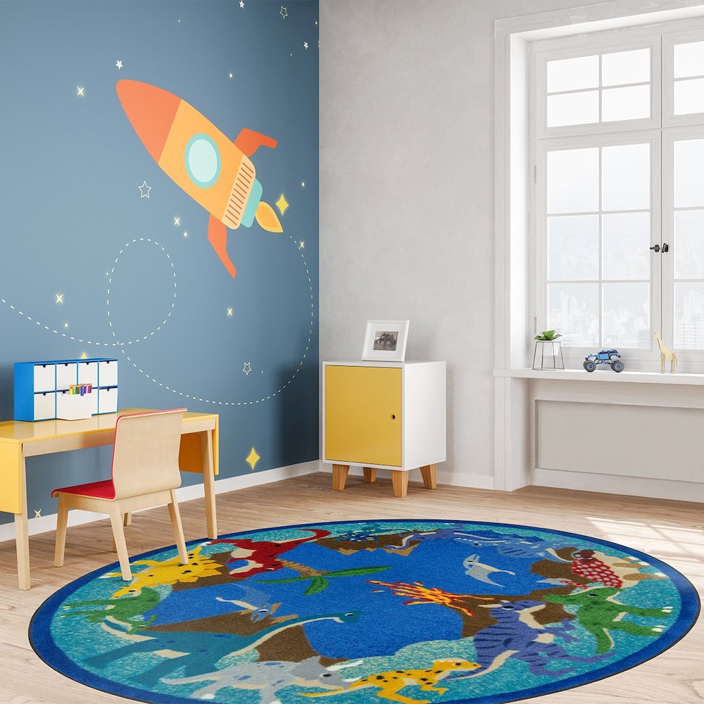 Kid Essentials Dino Parade 7'7" Round Area Rug in Color Multi. Picture 2