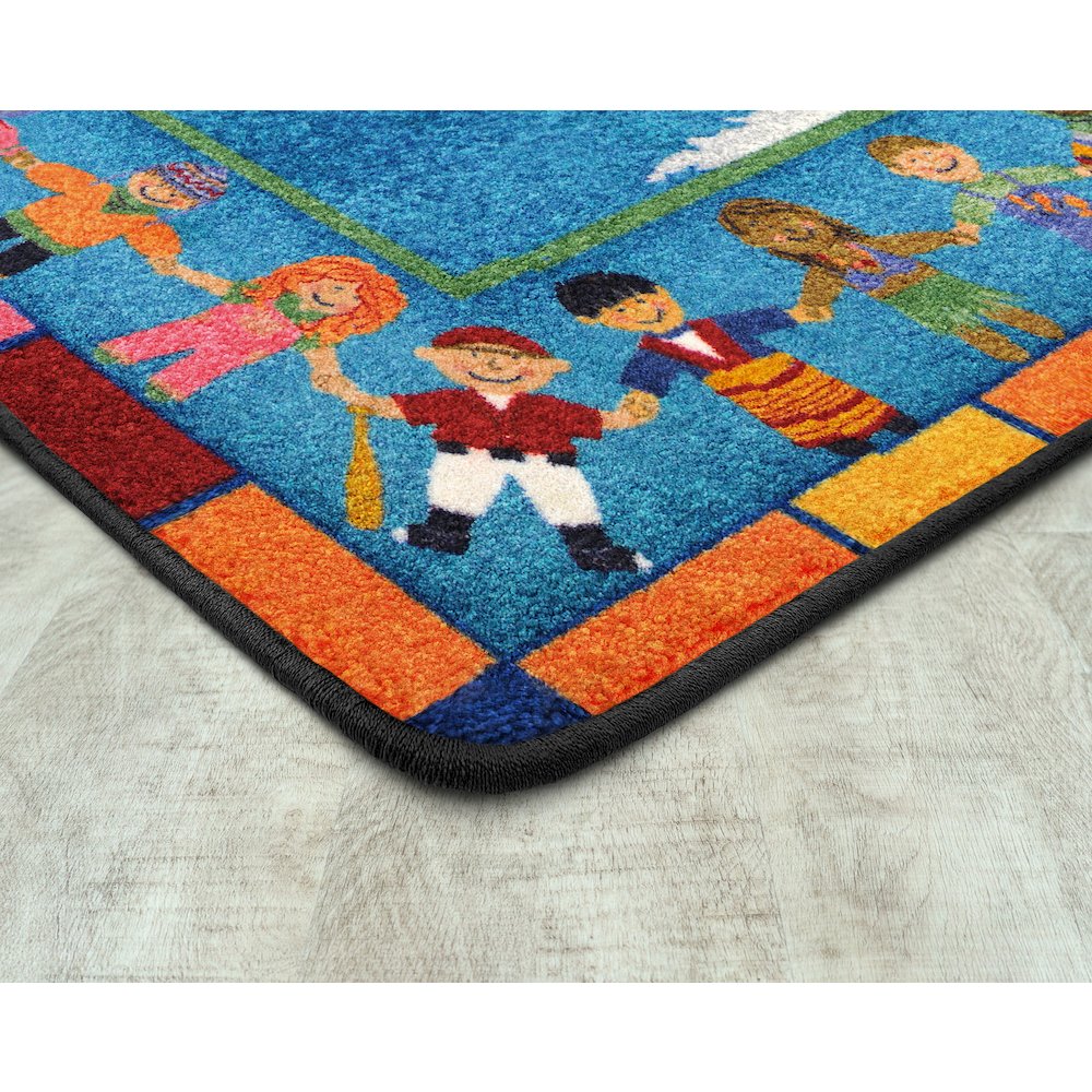 Kid Essentials Hands Around the World 2'8" x 3'10" Area Rug in Color Multi. Picture 2