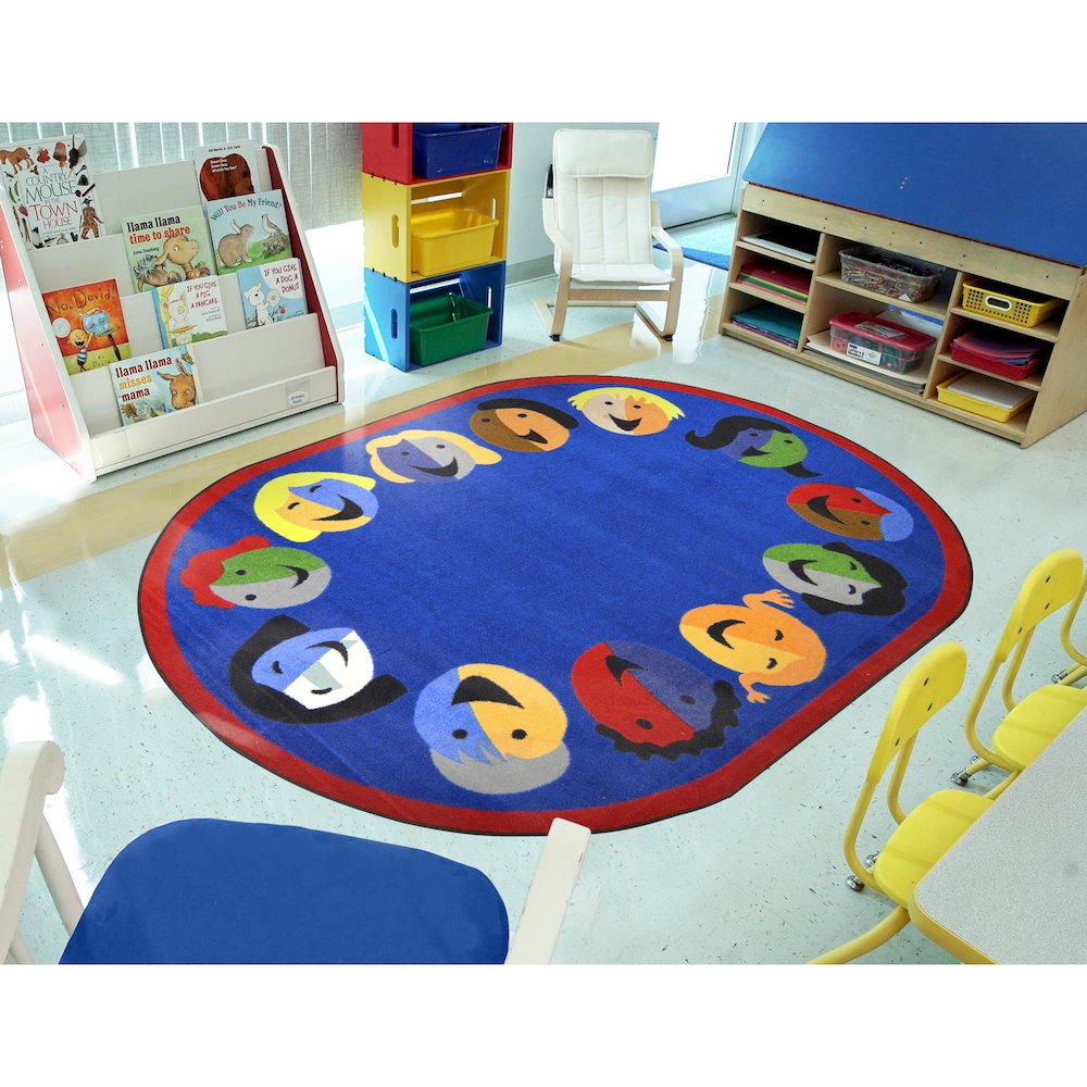 Kid Essentials Joyful Faces 5'4" x 7'8" Oval Area Rug in Color Blue. Picture 3