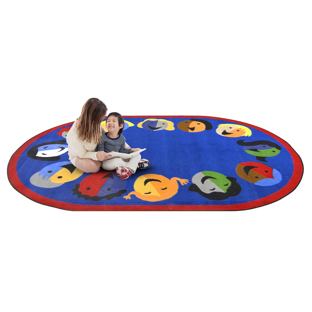 Kid Essentials Joyful Faces 5'4" x 7'8" Oval Area Rug in Color Blue. Picture 2