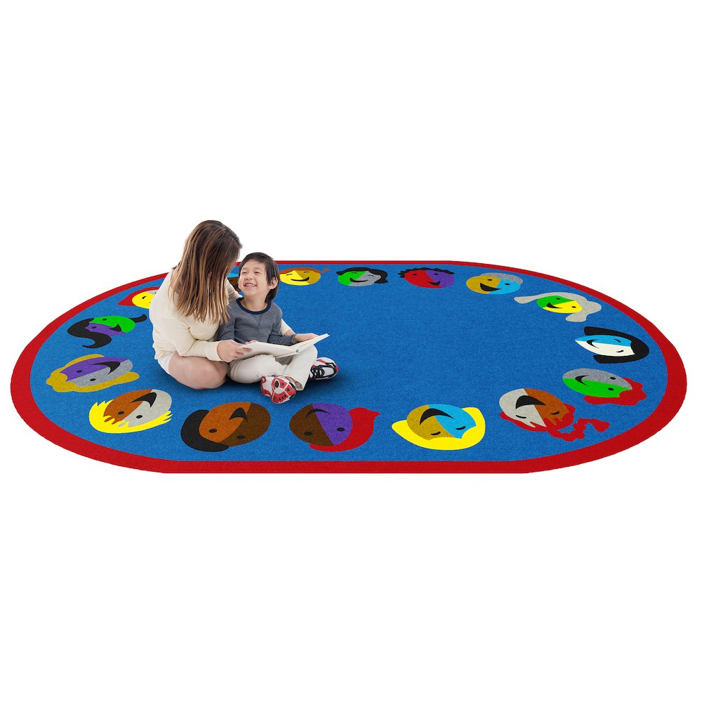 Kid Essentials Joyful Faces 7'8" x 10'9" Oval Area Rug in Color Blue. Picture 2