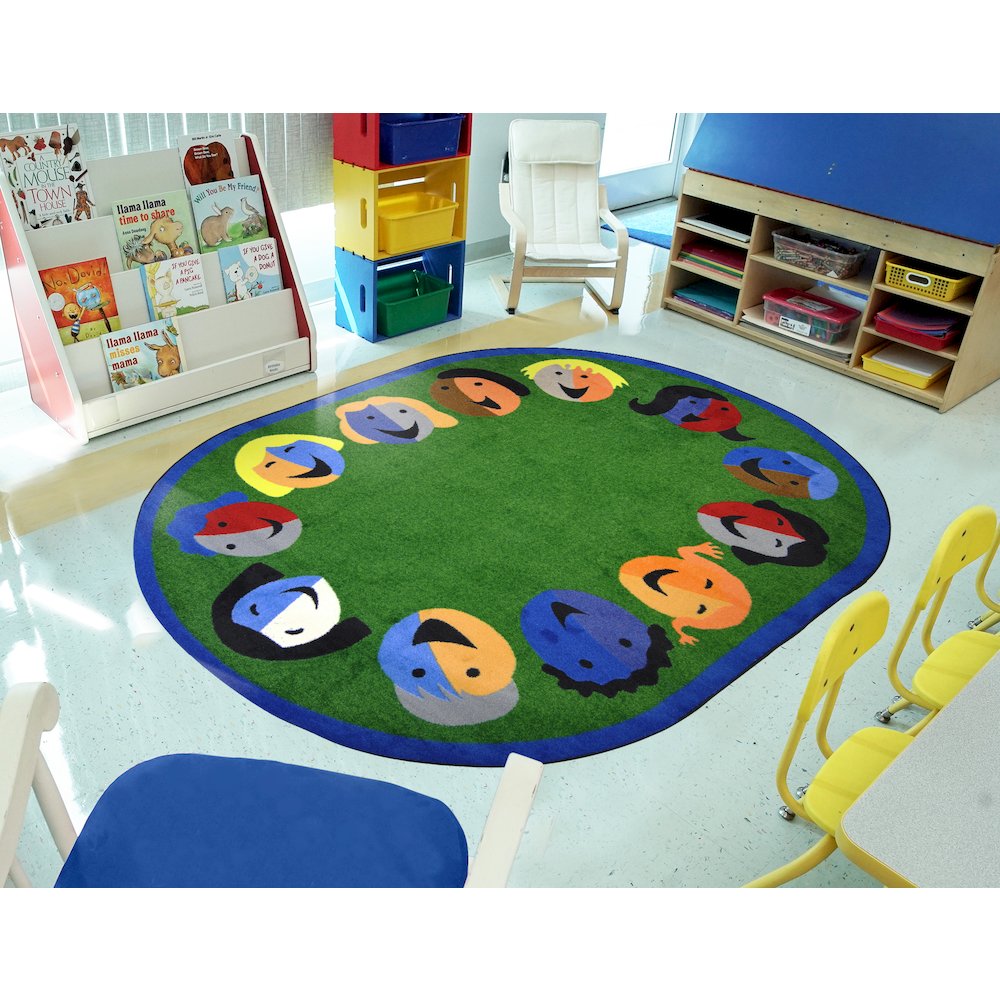 Kid Essentials Joyful Faces 5'4" x 7'8" Oval Area Rug in Color Green. Picture 3