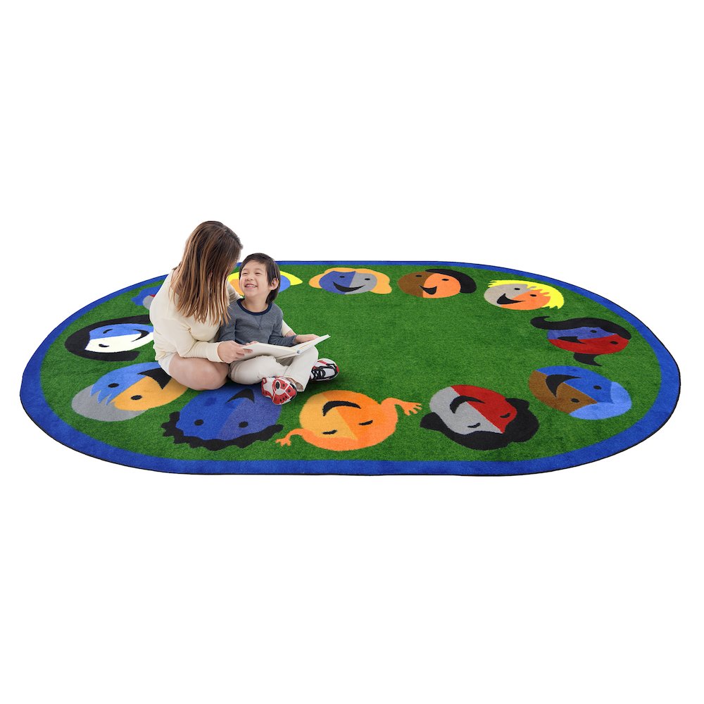 Kid Essentials Joyful Faces 5'4" x 7'8" Oval Area Rug in Color Green. Picture 2