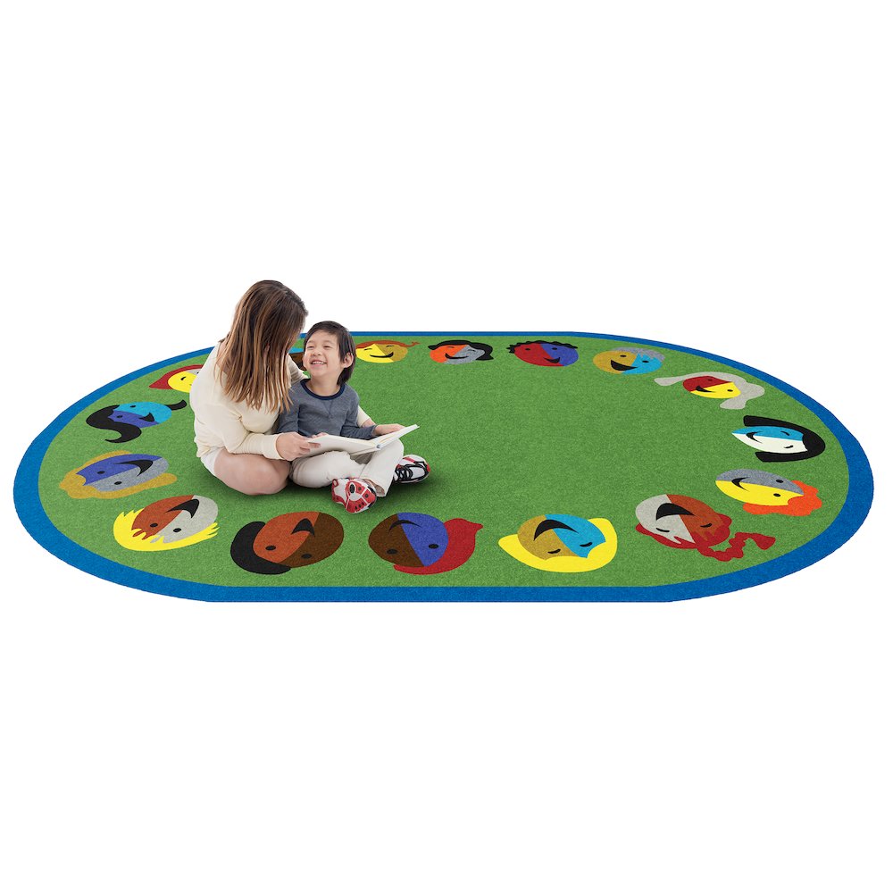 Kid Essentials Joyful Faces 7'8" x 10'9" Oval Area Rug in Color Green. Picture 2
