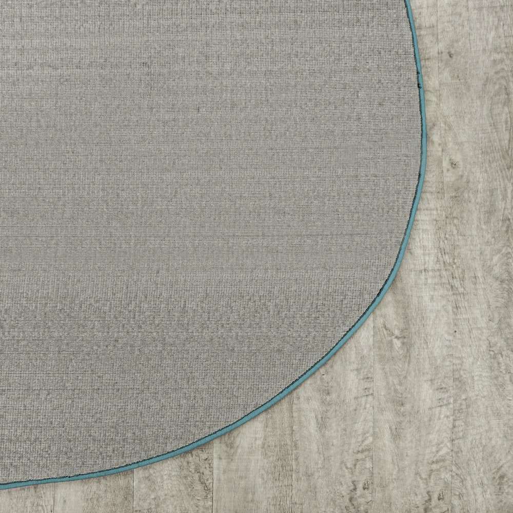 Kid Essentials Just Kidding 6' x 9' Oval Area Rug in Color Seafoam. Picture 4