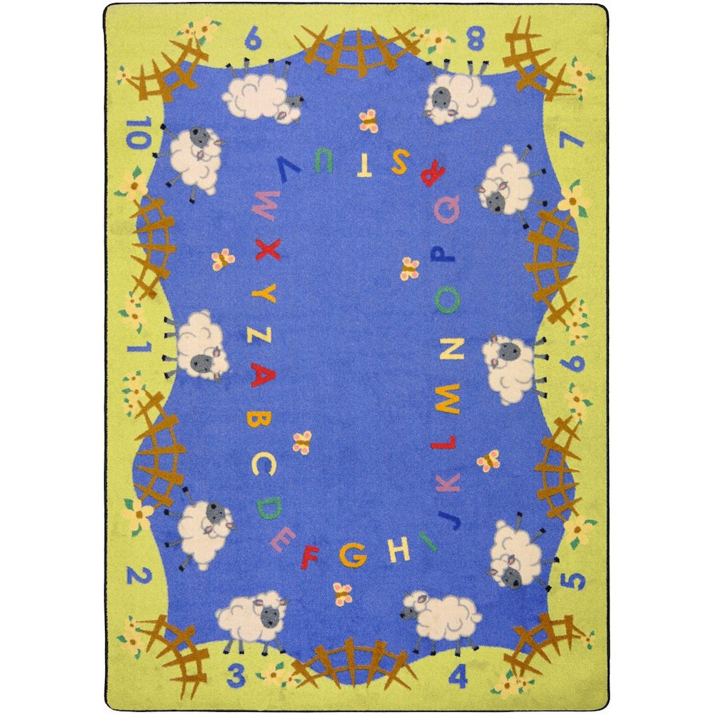 Kid Essentials Lamby Pie 5'4" x 7'8" Area Rug in Color Multi. Picture 1